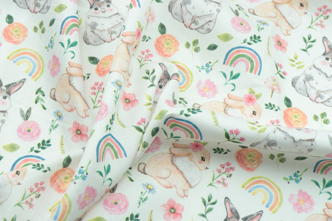 white pink and green floral textile