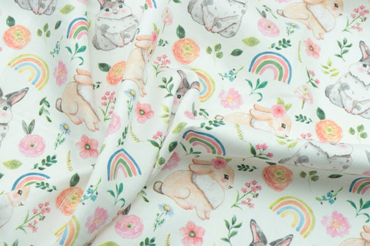 white pink and green floral textile